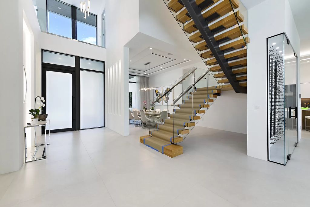 The Home in Boca Raton is a newly completed modern luxury home with Smart Home Technology in St Andrews Country Club now available for sale. This home located at 17745 Scarsdale Way, Boca Raton, Florida