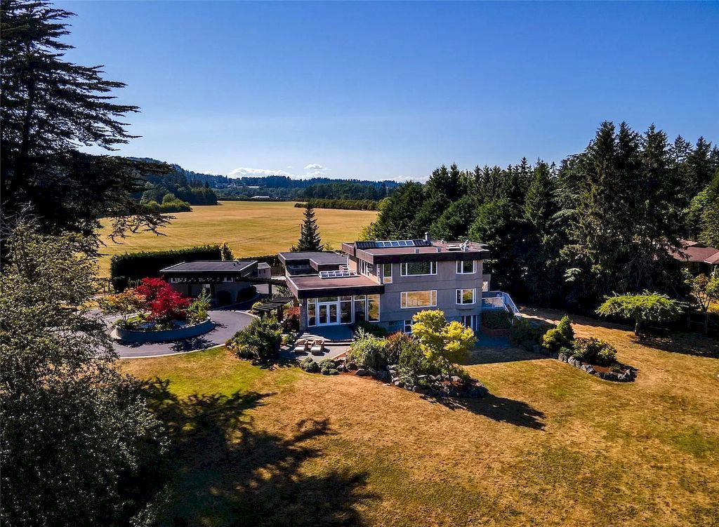 The Spectacular Beachfront Estate in Saanich is a luxury home now available for sale. This home is located at 5605 Parker Ave, Saanich, BC V8Y 2N2, Canada