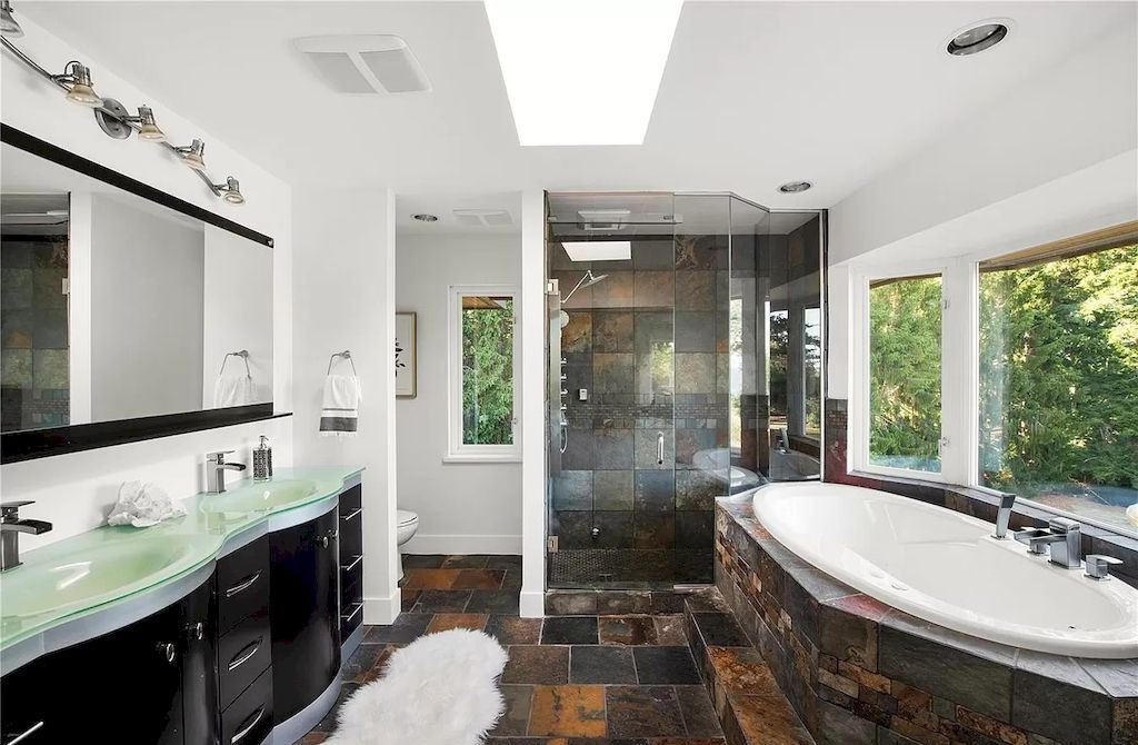 The Spectacular Beachfront Estate in Saanich is a luxury home now available for sale. This home is located at 5605 Parker Ave, Saanich, BC V8Y 2N2, Canada