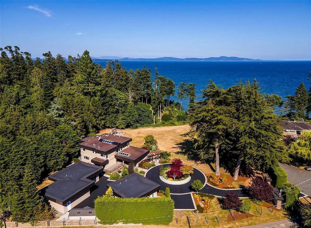 The Spectacular Beachfront Estate in Saanich is a luxury home now available for sale. This home is located at 5605 Parker Ave, Saanich, BC V8Y 2N2, Canada
