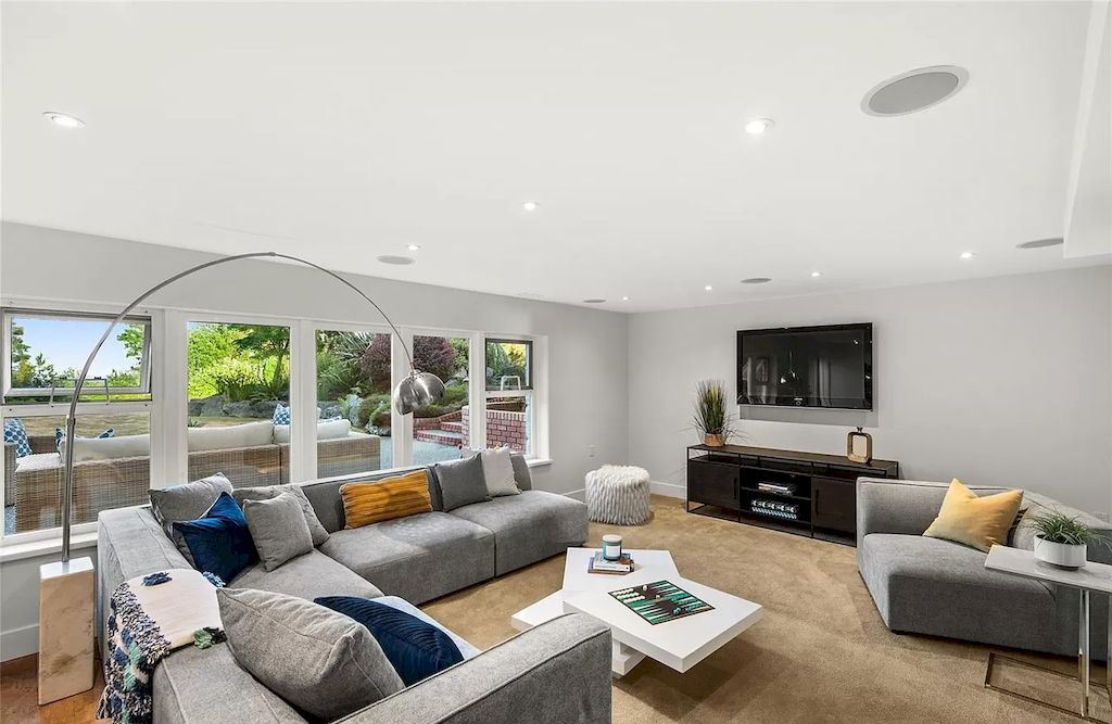The Spectacular Beachfront Estate in Saanich is a luxury home now available for sale. This home is located at 5605 Parker Ave, Saanich, BC V8Y 2N2, Canada
