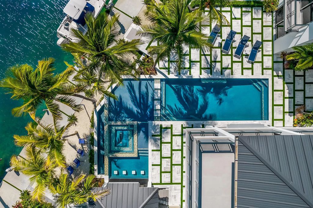 The Home in Florida is a stunning waterfront masterpiece in Lower Matecumbe Key with breathtaking views of the sunset now available for sale. This home located at 146 Bayview Dr, Lower Matecumbe Key, Florida