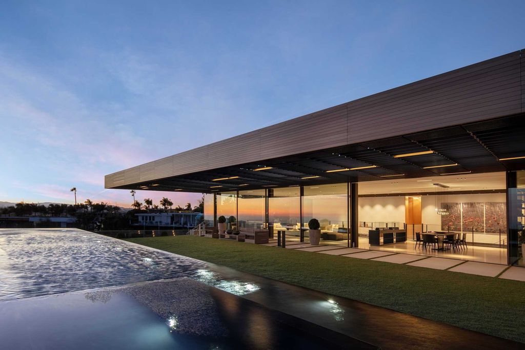 The Bird Streets Mansion is a spectacular new contemporary estate was envisioned by architect Zoltan Pali and home builder Dugally Oberfeld now available for sale. This home located at 9344 Nightingale Dr, Los Angeles, California