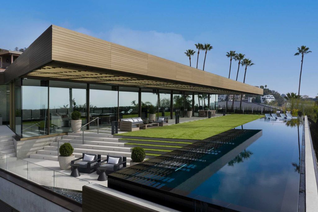 The Bird Streets Mansion is a spectacular new contemporary estate was envisioned by architect Zoltan Pali and home builder Dugally Oberfeld now available for sale. This home located at 9344 Nightingale Dr, Los Angeles, California