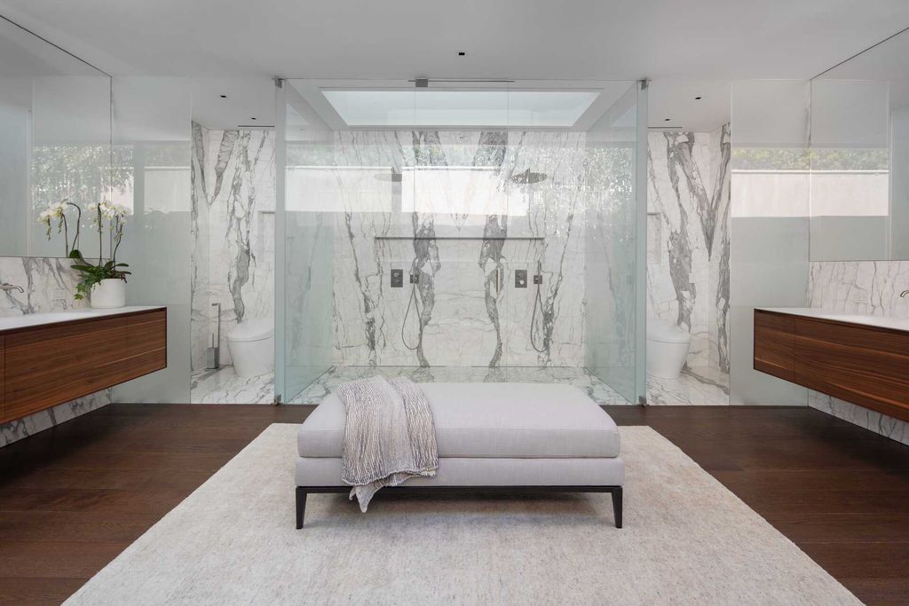 The Bird Streets Mansion is a spectacular new contemporary estate was envisioned by architect Zoltan Pali and home builder Dugally Oberfeld now available for sale. This home located at 9344 Nightingale Dr, Los Angeles, California