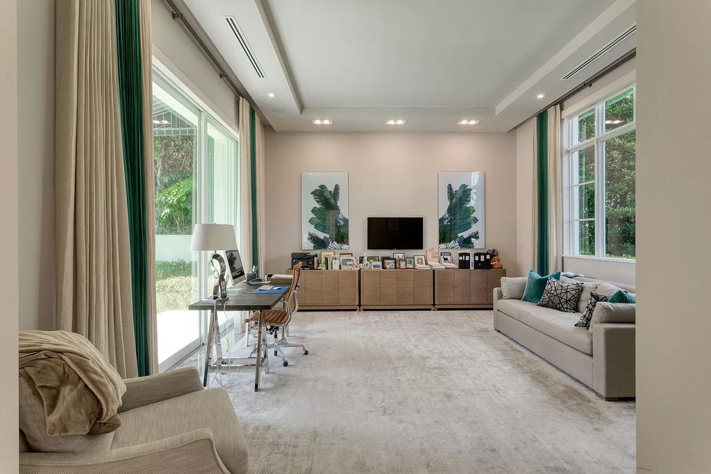The Delray Beach Home is a beautifully designed two story contemporary estate with tropically landscaped back yard now available for sale. This home located at 609 Seagate Dr, Delray Beach, Florida