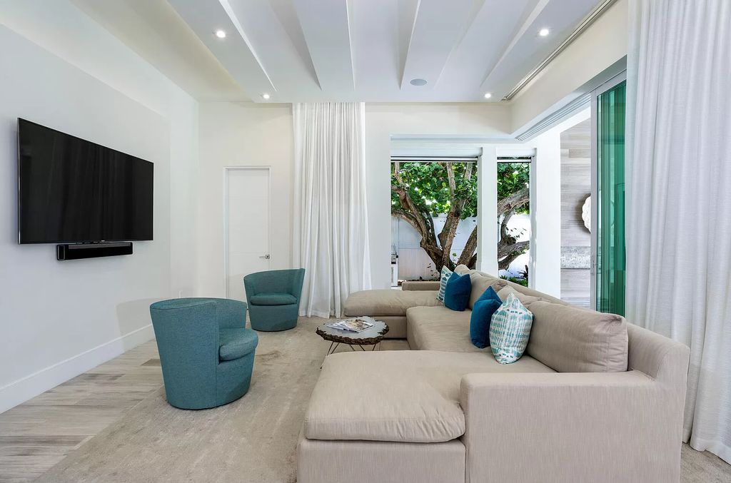 The Delray Beach Home is a beautifully designed two story contemporary estate with tropically landscaped back yard now available for sale. This home located at 609 Seagate Dr, Delray Beach, Florida