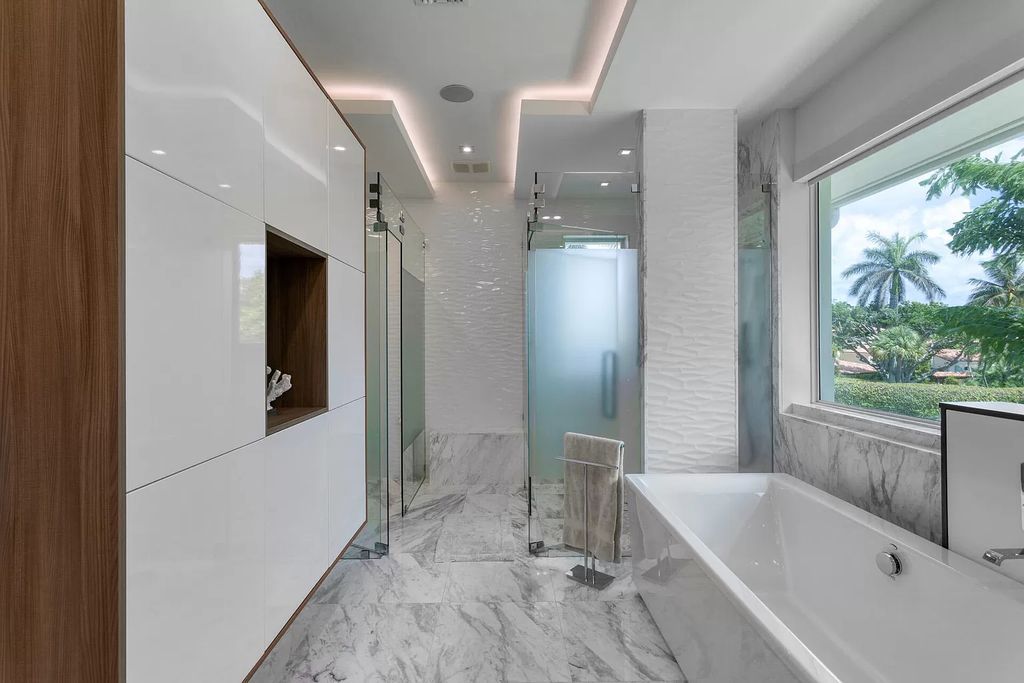 The Delray Beach Home is a beautifully designed two story contemporary estate with tropically landscaped back yard now available for sale. This home located at 609 Seagate Dr, Delray Beach, Florida