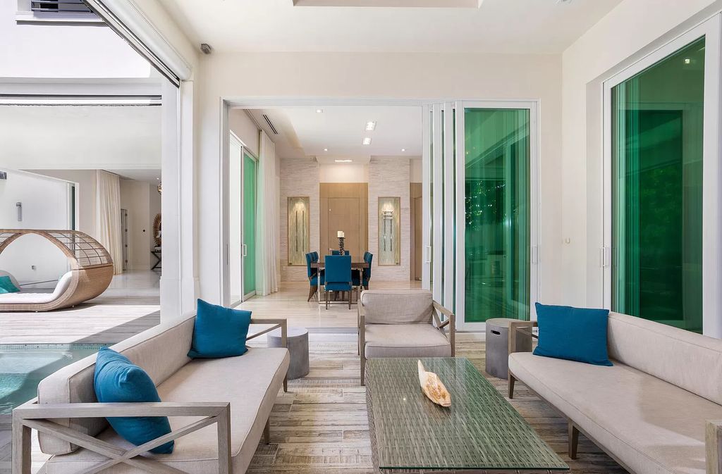 The Delray Beach Home is a beautifully designed two story contemporary estate with tropically landscaped back yard now available for sale. This home located at 609 Seagate Dr, Delray Beach, Florida