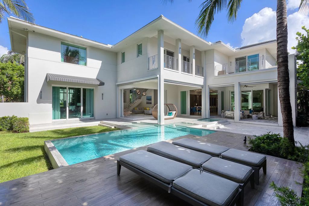 The Delray Beach Home is a beautifully designed two story contemporary estate with tropically landscaped back yard now available for sale. This home located at 609 Seagate Dr, Delray Beach, Florida