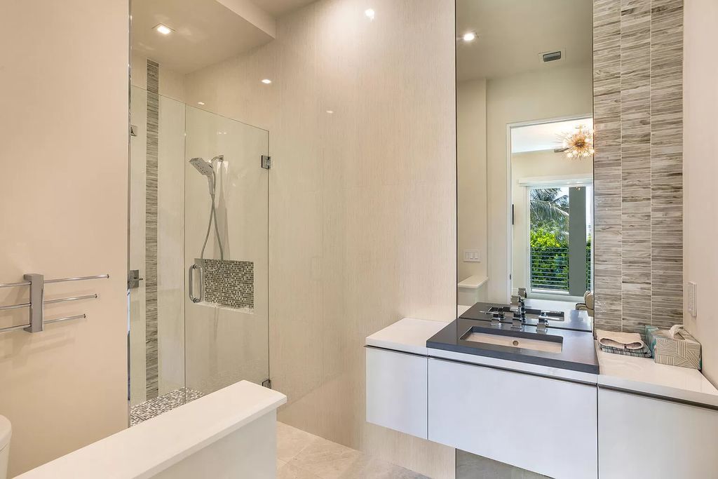 The Delray Beach Home is a beautifully designed two story contemporary estate with tropically landscaped back yard now available for sale. This home located at 609 Seagate Dr, Delray Beach, Florida