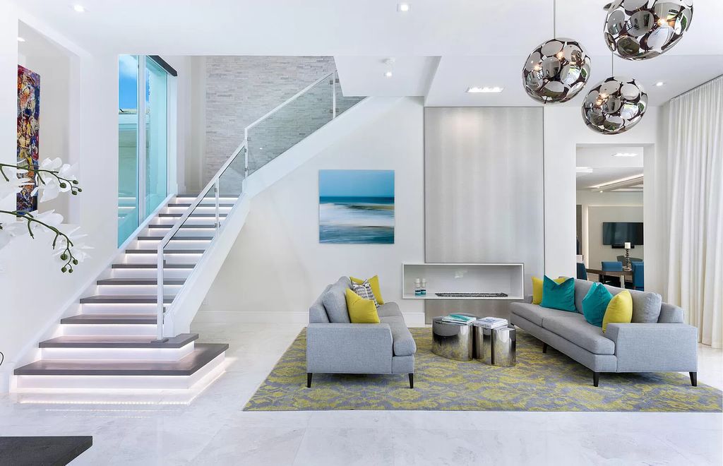 The Delray Beach Home is a beautifully designed two story contemporary estate with tropically landscaped back yard now available for sale. This home located at 609 Seagate Dr, Delray Beach, Florida