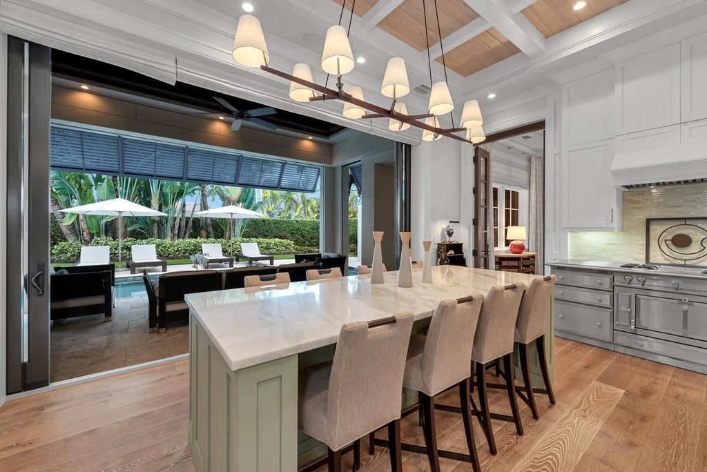 The Home in Naples is an exquisite estate now with glass walls open to outdoor veranda & pool blending indoor and outdoor available for sale. This home located at 2284 Crayton Rd, Naples, Florida