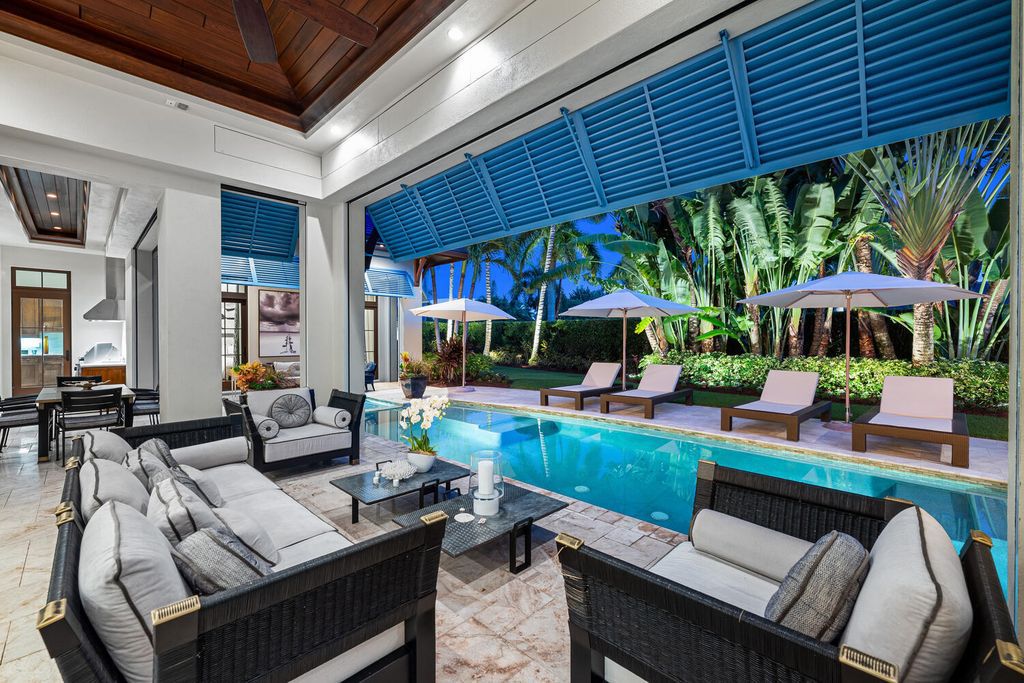 The Home in Naples is an exquisite estate now with glass walls open to outdoor veranda & pool blending indoor and outdoor available for sale. This home located at 2284 Crayton Rd, Naples, Florida