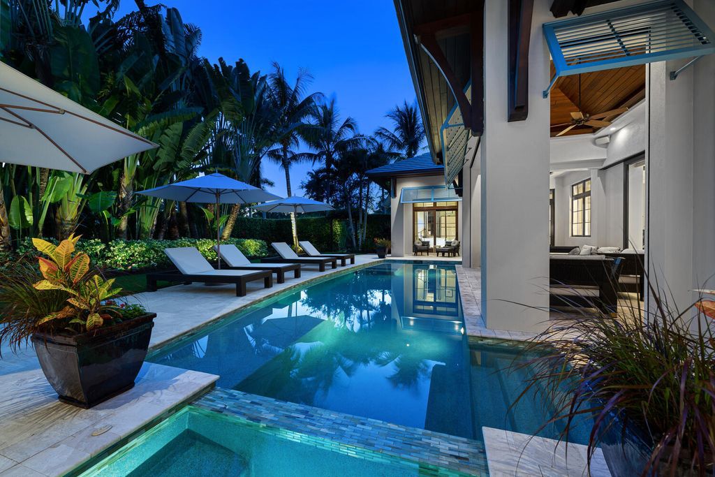 The Home in Naples is an exquisite estate now with glass walls open to outdoor veranda & pool blending indoor and outdoor available for sale. This home located at 2284 Crayton Rd, Naples, Florida