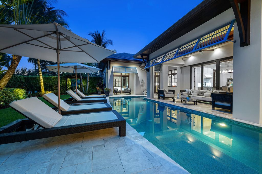 The Home in Naples is an exquisite estate now with glass walls open to outdoor veranda & pool blending indoor and outdoor available for sale. This home located at 2284 Crayton Rd, Naples, Florida