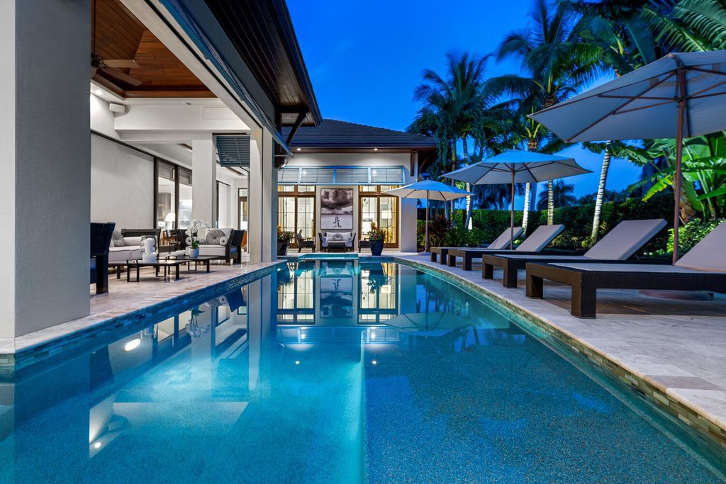 The Home in Naples is an exquisite estate now with glass walls open to outdoor veranda & pool blending indoor and outdoor available for sale. This home located at 2284 Crayton Rd, Naples, Florida