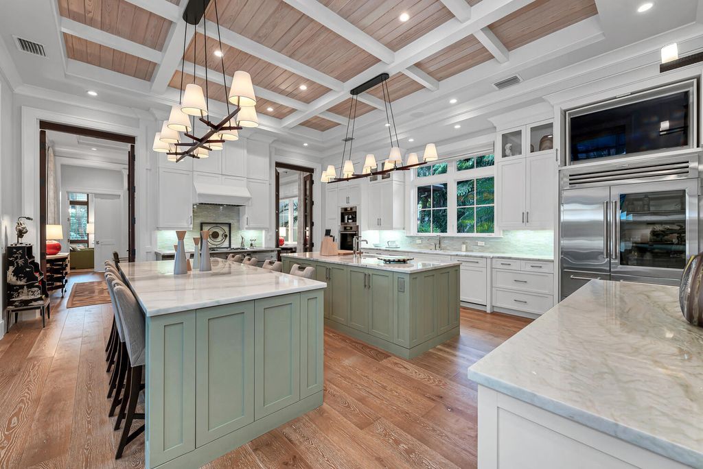 The Home in Naples is an exquisite estate now with glass walls open to outdoor veranda & pool blending indoor and outdoor available for sale. This home located at 2284 Crayton Rd, Naples, Florida