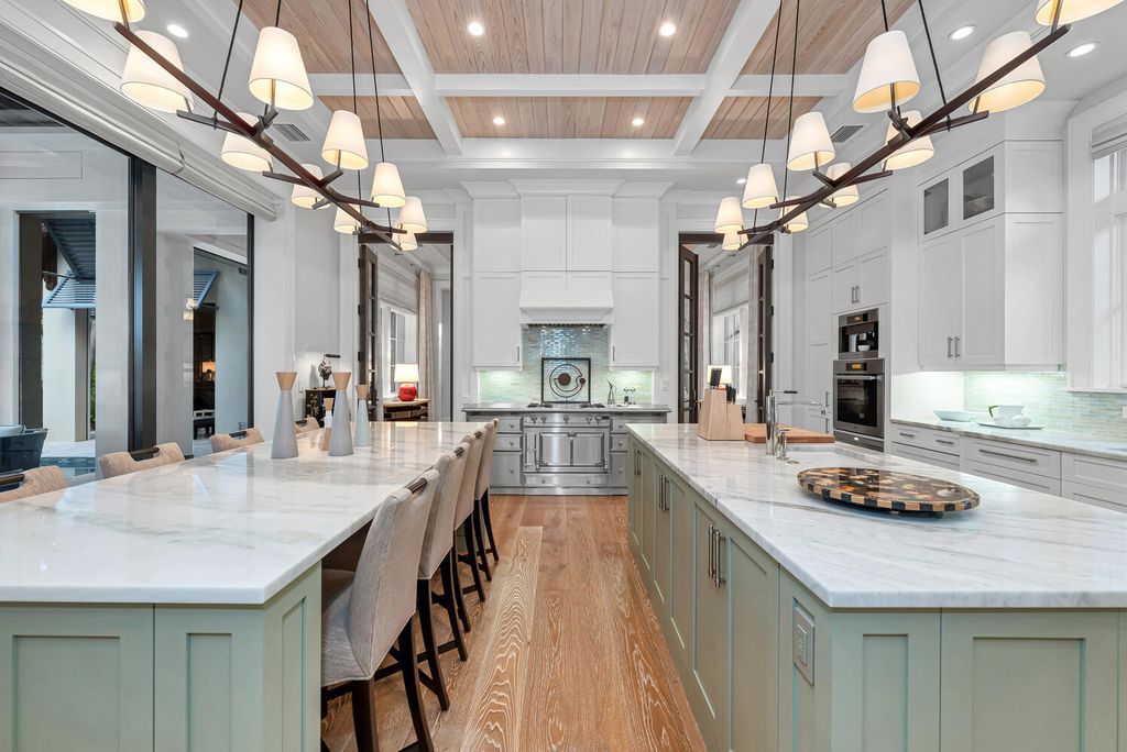 The Home in Naples is an exquisite estate now with glass walls open to outdoor veranda & pool blending indoor and outdoor available for sale. This home located at 2284 Crayton Rd, Naples, Florida
