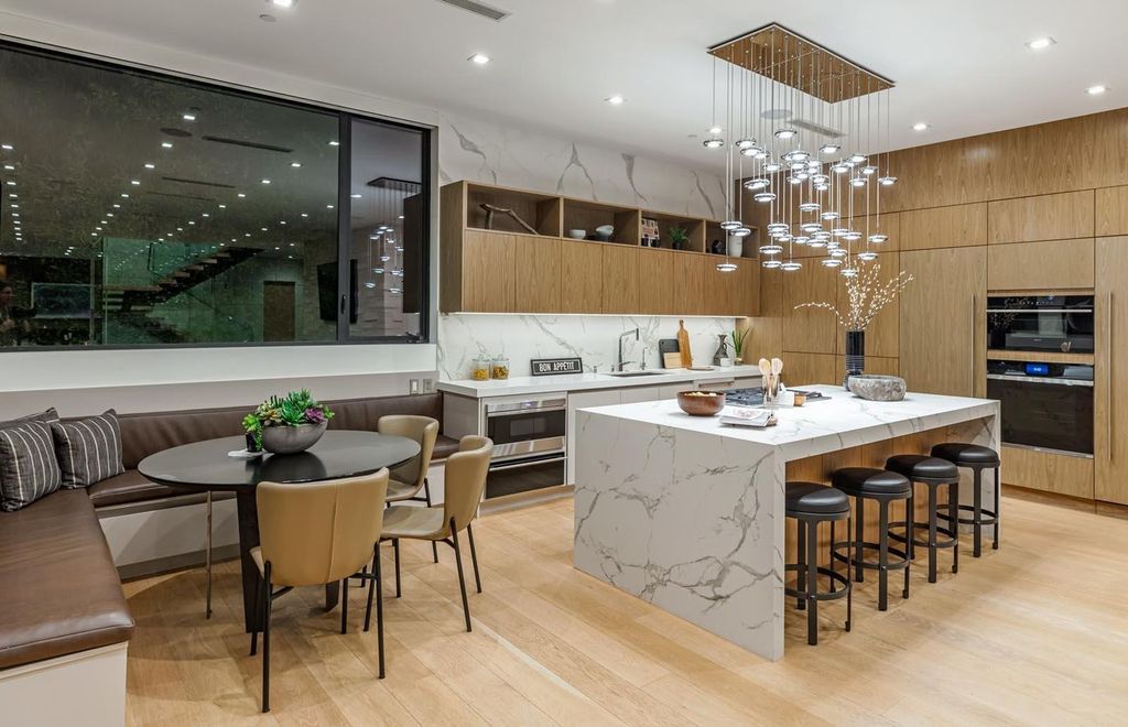 The Los Angeles Home is a stunning three-story architectural masterpiece located on a prestigious street with panoramic ocean views now available for sale. This home located at 815 N Tigertail Rd, Los Angeles, California