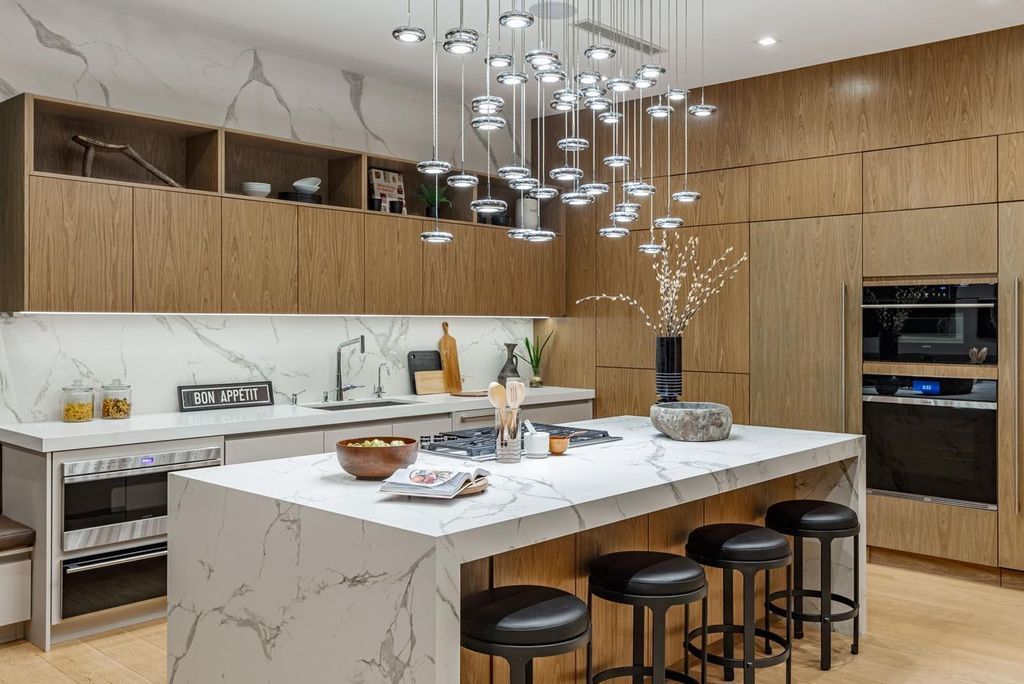 The Los Angeles Home is a stunning three-story architectural masterpiece located on a prestigious street with panoramic ocean views now available for sale. This home located at 815 N Tigertail Rd, Los Angeles, California