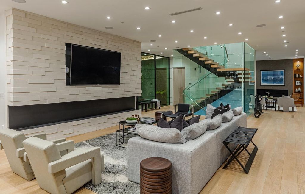 The Los Angeles Home is a stunning three-story architectural masterpiece located on a prestigious street with panoramic ocean views now available for sale. This home located at 815 N Tigertail Rd, Los Angeles, California