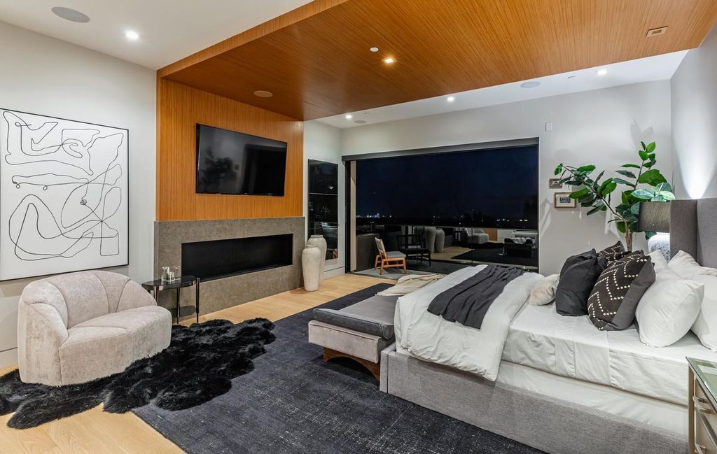 The Los Angeles Home is a stunning three-story architectural masterpiece located on a prestigious street with panoramic ocean views now available for sale. This home located at 815 N Tigertail Rd, Los Angeles, California