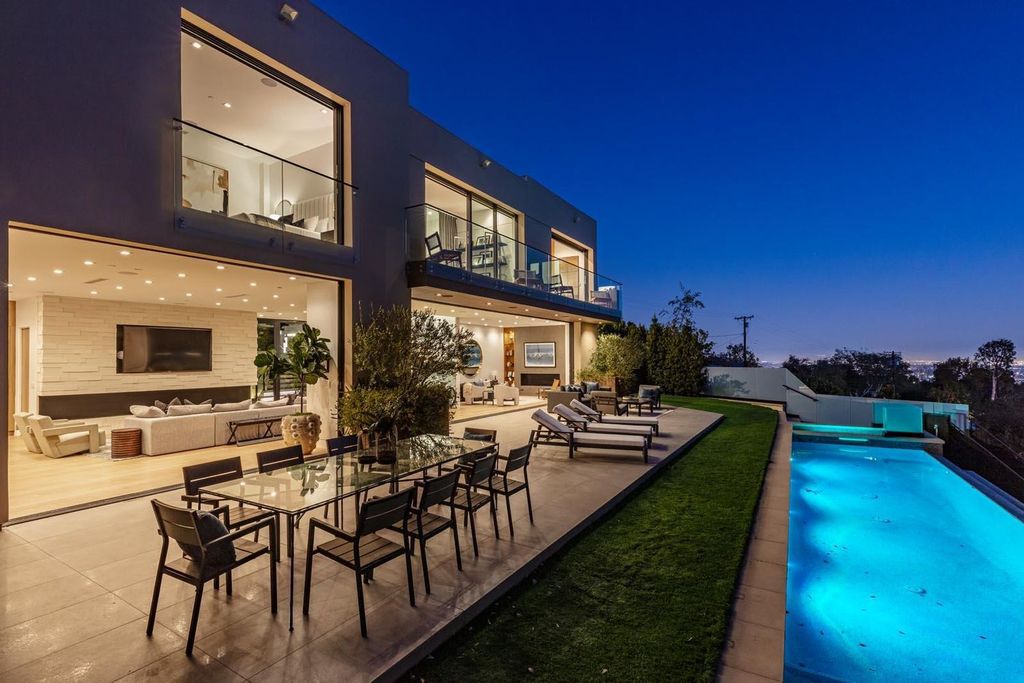 The Los Angeles Home is a stunning three-story architectural masterpiece located on a prestigious street with panoramic ocean views now available for sale. This home located at 815 N Tigertail Rd, Los Angeles, California