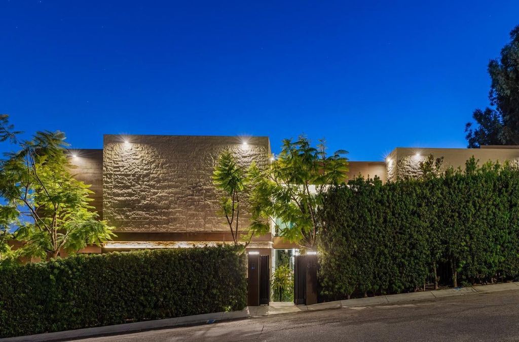 The Los Angeles Home is a stunning three-story architectural masterpiece located on a prestigious street with panoramic ocean views now available for sale. This home located at 815 N Tigertail Rd, Los Angeles, California