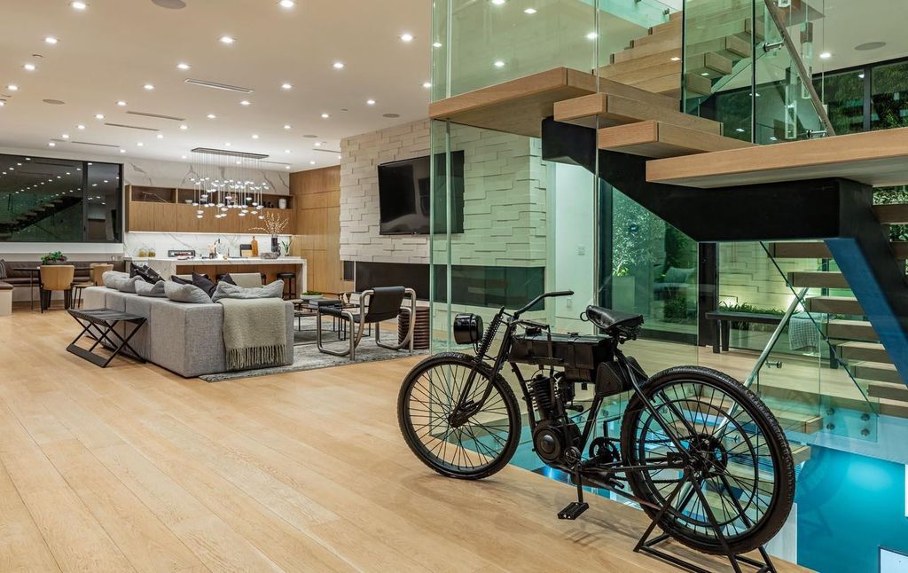 The Los Angeles Home is a stunning three-story architectural masterpiece located on a prestigious street with panoramic ocean views now available for sale. This home located at 815 N Tigertail Rd, Los Angeles, California