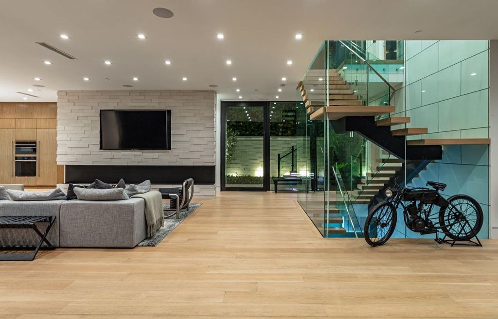 The Los Angeles Home is a stunning three-story architectural masterpiece located on a prestigious street with panoramic ocean views now available for sale. This home located at 815 N Tigertail Rd, Los Angeles, California