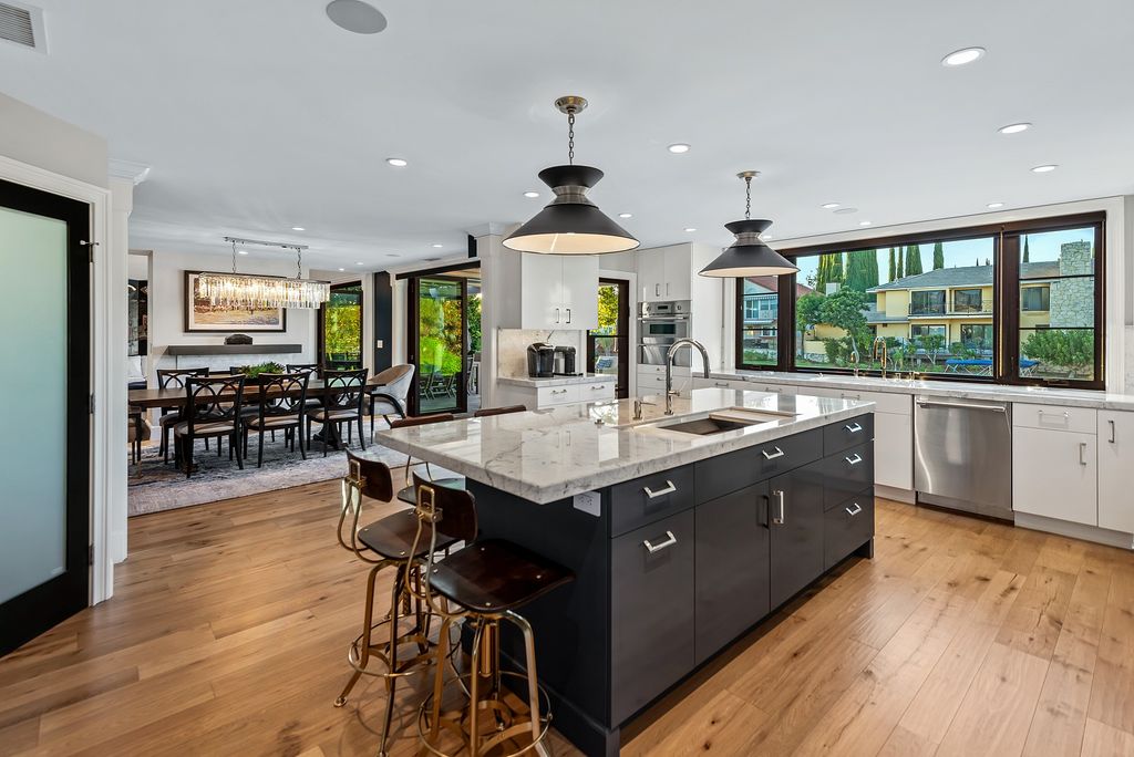 The House in Thousand Oaks is an absolutely stunning modern farmhouse lake front estate with a premier location now available for sale. This home located at 1371 Redsail Cir, Thousand Oaks, California
