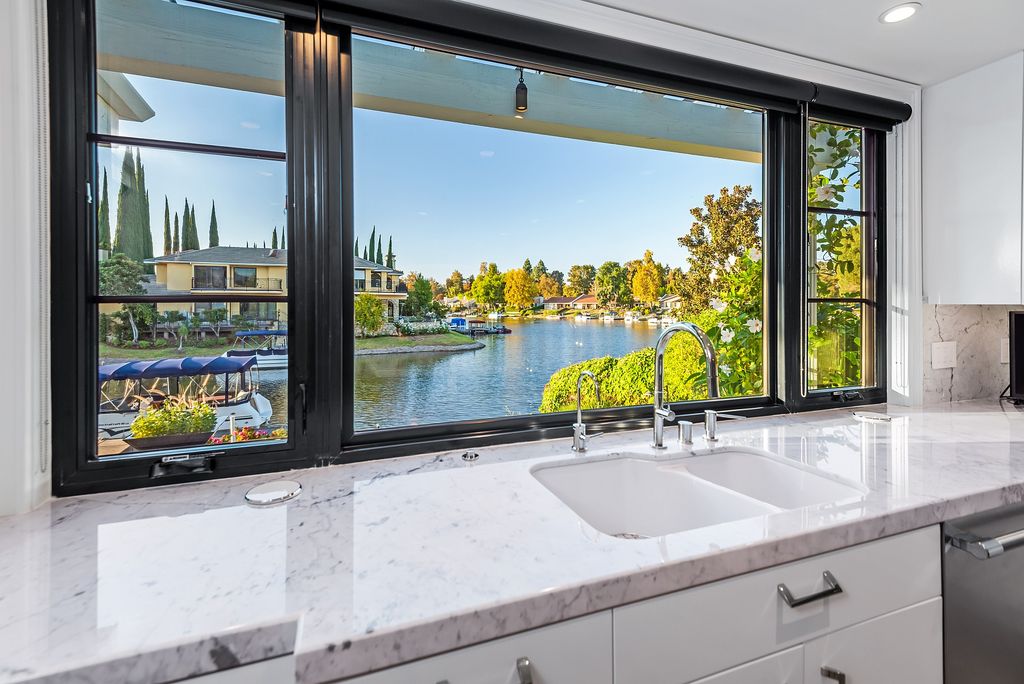 The House in Thousand Oaks is an absolutely stunning modern farmhouse lake front estate with a premier location now available for sale. This home located at 1371 Redsail Cir, Thousand Oaks, California