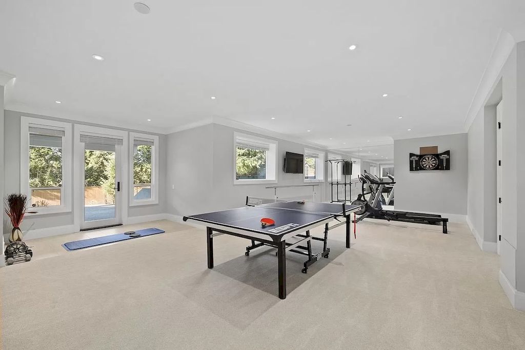 The Beautiful Custom Residence in Surrey is a luxurious home now available for sale. This home located at 14033 28th Ave, Surrey, BC V4P 0A3, Canada
