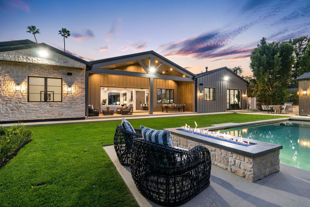 The Modern Farmhouse in Encino perfectly positioned with privacy on a supreme corner lot in Amestoy Estates now available for sale. This home located at 17201 Weddington St, Encino, California