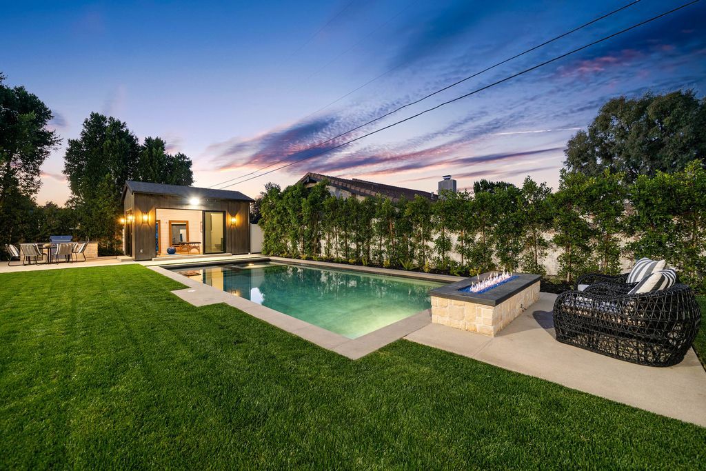 The Modern Farmhouse in Encino perfectly positioned with privacy on a supreme corner lot in Amestoy Estates now available for sale. This home located at 17201 Weddington St, Encino, California