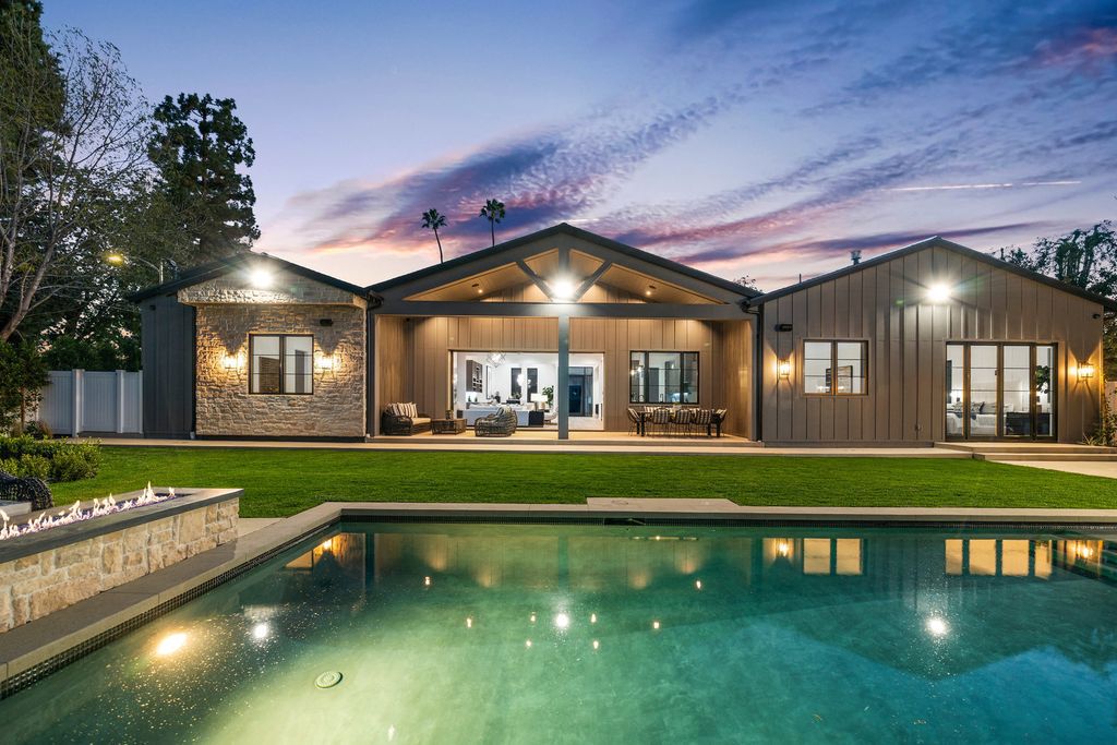 The Modern Farmhouse in Encino perfectly positioned with privacy on a supreme corner lot in Amestoy Estates now available for sale. This home located at 17201 Weddington St, Encino, California