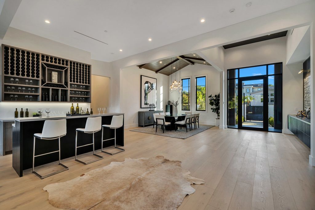 The Modern Farmhouse in Encino perfectly positioned with privacy on a supreme corner lot in Amestoy Estates now available for sale. This home located at 17201 Weddington St, Encino, California