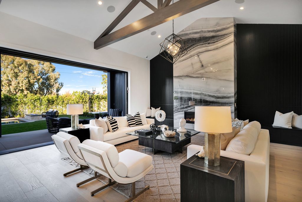 The Modern Farmhouse in Encino perfectly positioned with privacy on a supreme corner lot in Amestoy Estates now available for sale. This home located at 17201 Weddington St, Encino, California