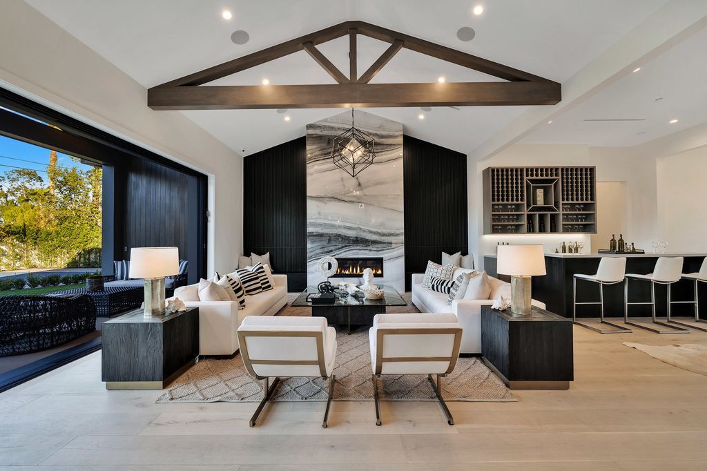 The Modern Farmhouse in Encino perfectly positioned with privacy on a supreme corner lot in Amestoy Estates now available for sale. This home located at 17201 Weddington St, Encino, California