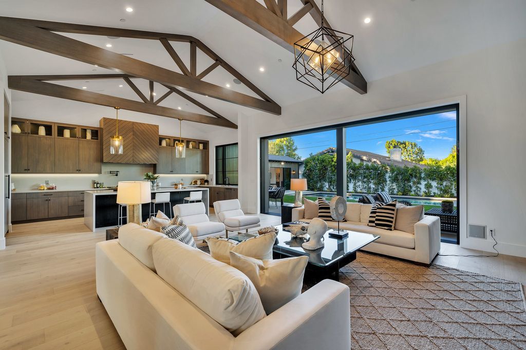The Modern Farmhouse in Encino perfectly positioned with privacy on a supreme corner lot in Amestoy Estates now available for sale. This home located at 17201 Weddington St, Encino, California