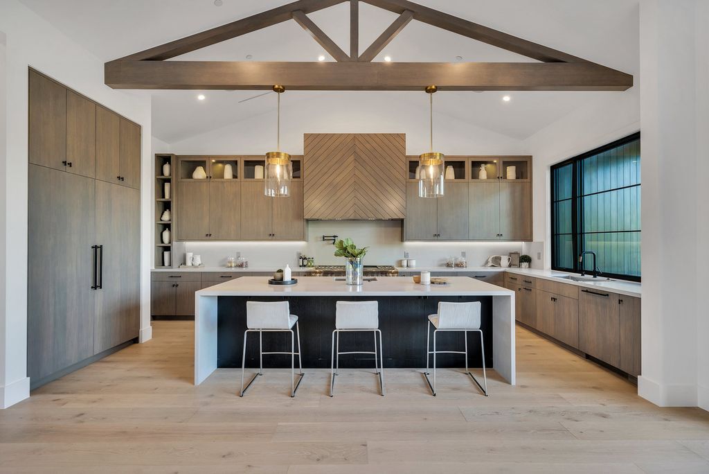 The Modern Farmhouse in Encino perfectly positioned with privacy on a supreme corner lot in Amestoy Estates now available for sale. This home located at 17201 Weddington St, Encino, California