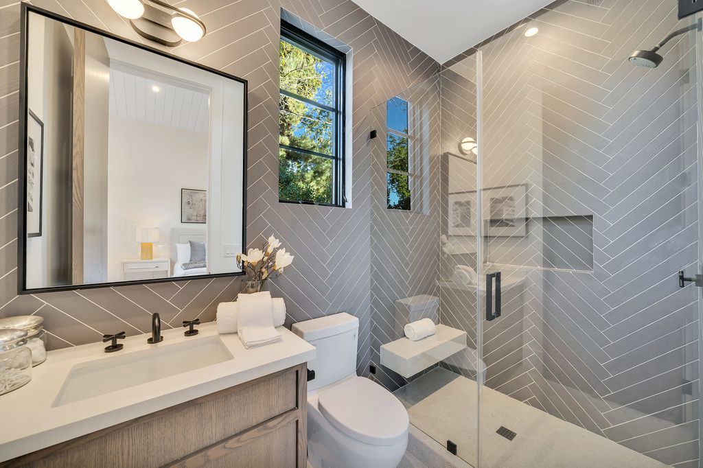 The Modern Farmhouse in Encino perfectly positioned with privacy on a supreme corner lot in Amestoy Estates now available for sale. This home located at 17201 Weddington St, Encino, California