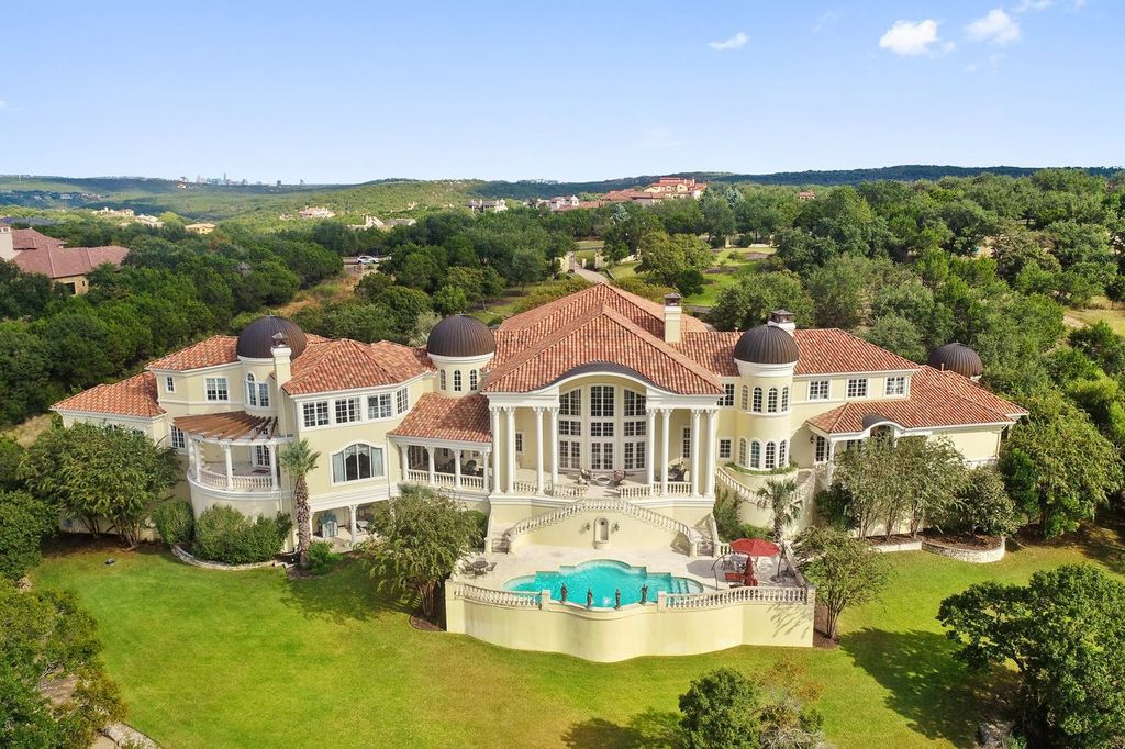The Mansion in Austin is a elegant Italian Baroque estate custom designed by Cornerstone Architect Group and built by Michael Deane Homes now available for sale. This home located at 7901 Escala Dr, Austin, Texas