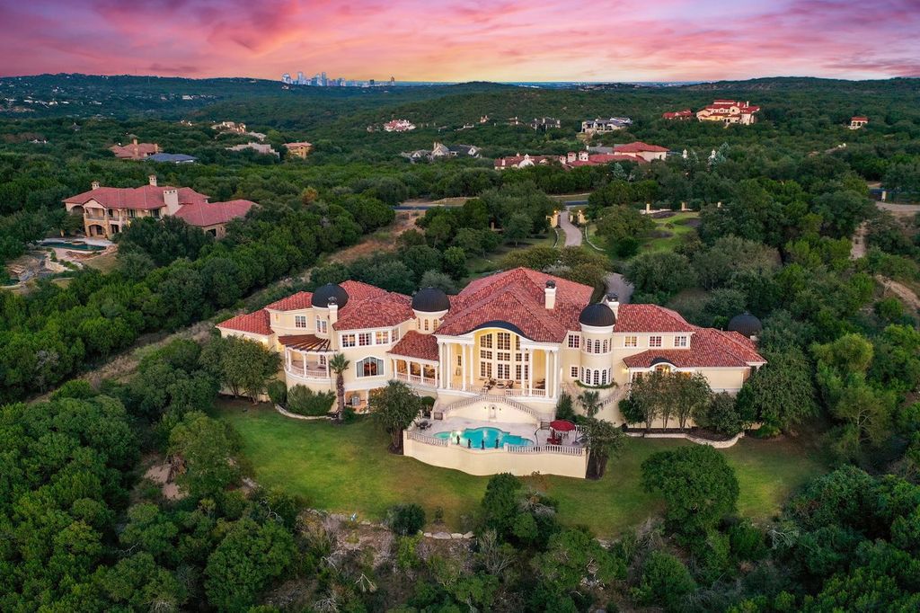 The Mansion in Austin is a elegant Italian Baroque estate custom designed by Cornerstone Architect Group and built by Michael Deane Homes now available for sale. This home located at 7901 Escala Dr, Austin, Texas