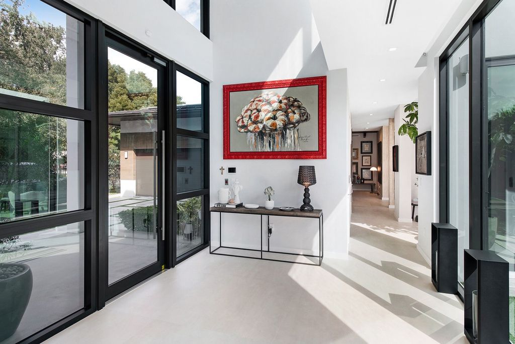The Home in Miami is a gorgeous fully furnished new construction home in the heart of South Miami’s High Pines neighborhood now available for sale. This home located at 5470 Sunset Dr, Miami, Florida