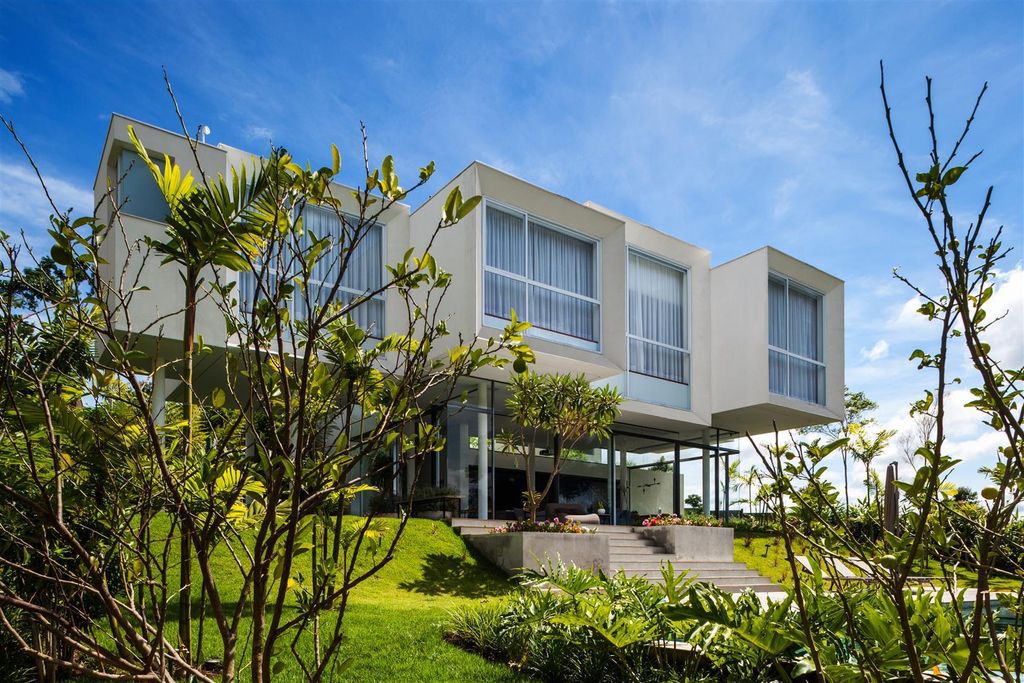 Neblina house stunning white volumes on sloping plot by FGMF Arquitetos 13