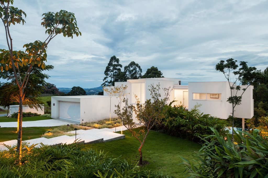 Neblina house stunning white volumes on sloping plot by FGMF Arquitetos 3