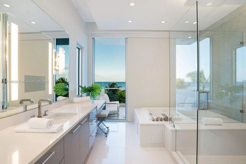 The Miami Beach Home is a stunning new modern construction estate in the esteemed gated Oceanfront community, Altos Del Mar. now available for sale. This house located at 7833 Atlantic Way, Miami Beach, Florida