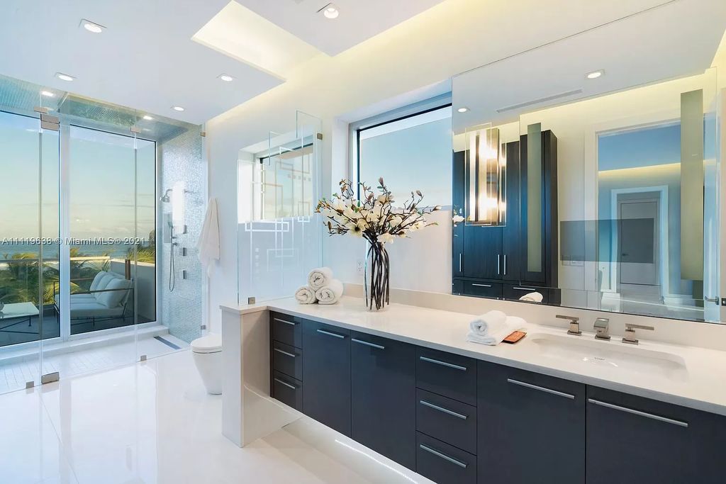 The Miami Beach Home is a stunning new modern construction estate in the esteemed gated Oceanfront community, Altos Del Mar. now available for sale. This house located at 7833 Atlantic Way, Miami Beach, Florida